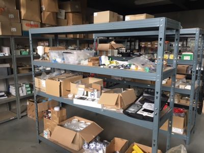 many boxes and boxes on the shelves in the warehouse