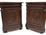pair of antique carved wood side tables with figures on them