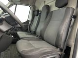 the interior of a van with two seats and a steering wheel