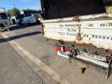 a truck that is parked on the side of the road
