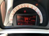 a close up of a car ' s dashboard with a speedometer