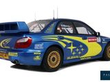 the car is blue and yellow with a yellow star on the side