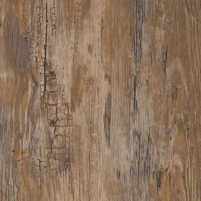 une image montrant un gros plan d'une surface en bois dont la peinture s'écaille