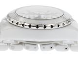 an image of a close up of a watch on a white surface