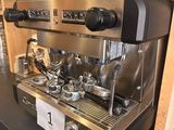 a coffee machine that is sitting on a table