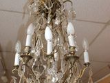 a chandelier hanging from the ceiling in a room