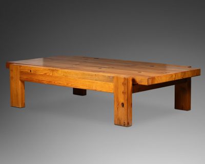 an image of a wooden table on a grey background