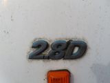 a close up of the number on the back of a white truck