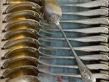 a lot of spoons and spoon spoons sitting on top of each other
