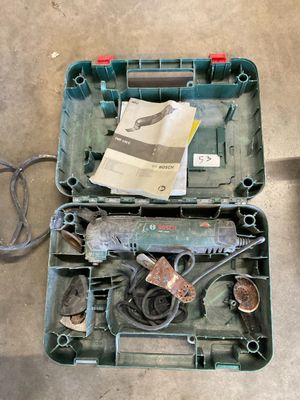 a tool box with tools in it sitting on the floor