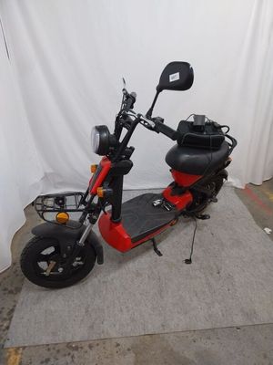 a scooter that is parked in a room