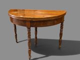 an image of a wooden table with two legs and a curved top