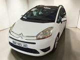 the white citrole is parked in the garage of a building