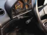 a close up of a steering wheel and dashboard of a car