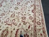 a person standing in front of a rug on the floor