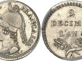 a close up of a coin with a woman on it