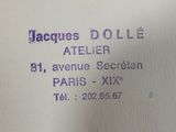 a label on a piece of paper that says jacques dole atelier
