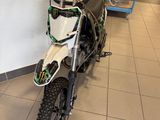 a dirt bike that is parked in a building