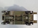 a toy army vehicle that is sitting on a table