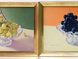 two paintings of grapes and grapes in a glass bowl on a table