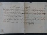 un gros plan d'un vieux document sur lequel figurent des inscriptions