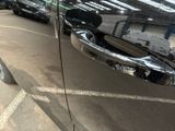 a close up of a car door handle on a car