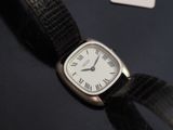 a watch with roman numerals on the face of it