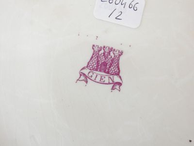 a picture of a plate with a crown on it