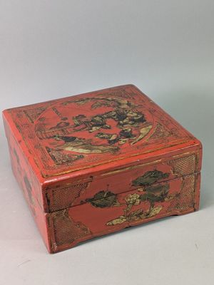 une image représentant une boîte rouge posée sur une table