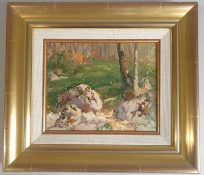 une image représentant un tableau de rochers et d'arbres dans un cadre doré