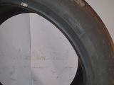 a close up of a tire with a hole in it