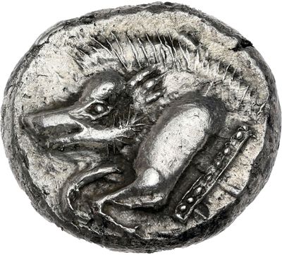 Gros plan sur une pièce d'argent ornée d'un cheval