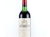 a bottle of wine that is sitting on a table