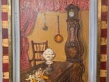 une photo d'un tableau représentant une scène de cuisine, dans un cadre