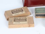 three boxes of cigarettes sitting next to each other on a table