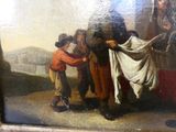un tableau représentant un groupe de personnes en train d'étendre du linge sur un mur