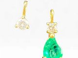 an image of a pair of emerald and diamond earrings