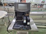 a machine that is sitting on a table in a factory