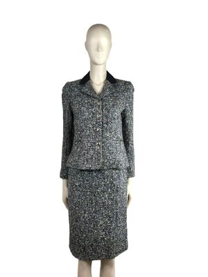 an image of a mannequin wearing a skirt suit