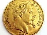l'image d'une pièce d'or sur laquelle figure le visage d'un homme