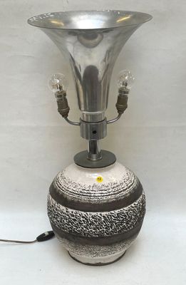 a lamp that is sitting on a white table