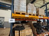 many boxes and packages on the shelves in the warehouse