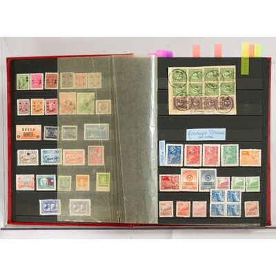 an open book with stamps on the pages and a picture of a man on a horse