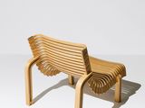 an image of a wooden bench sitting on top of a white floor