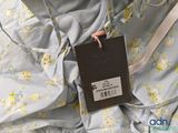 a picture of a dress with a tag attached to it