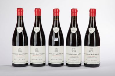 six bottles of wine are lined up in a row