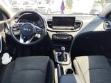 the interior of a car with a steering wheel, dashboard, and dash board