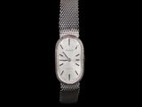 an image of a close up of a wrist watch on a black background