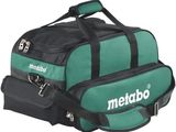 un gros plan d'un sac vert et noir sur fond blanc