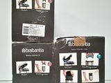 three boxes with different types of shoes on them sitting on a table